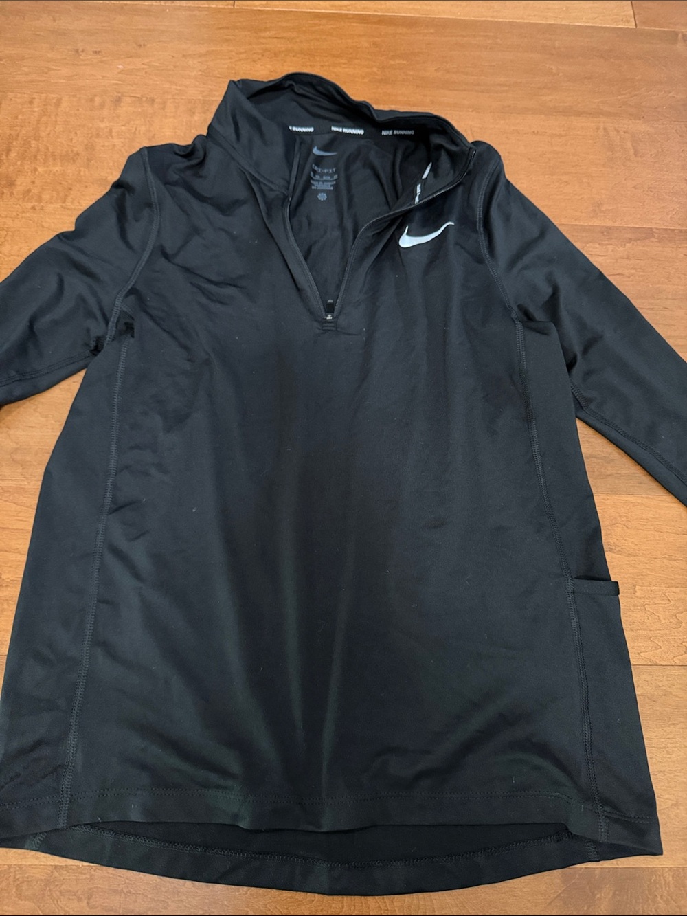 Nike Black Quarter-Zip Performance Pullover with White Swoosh